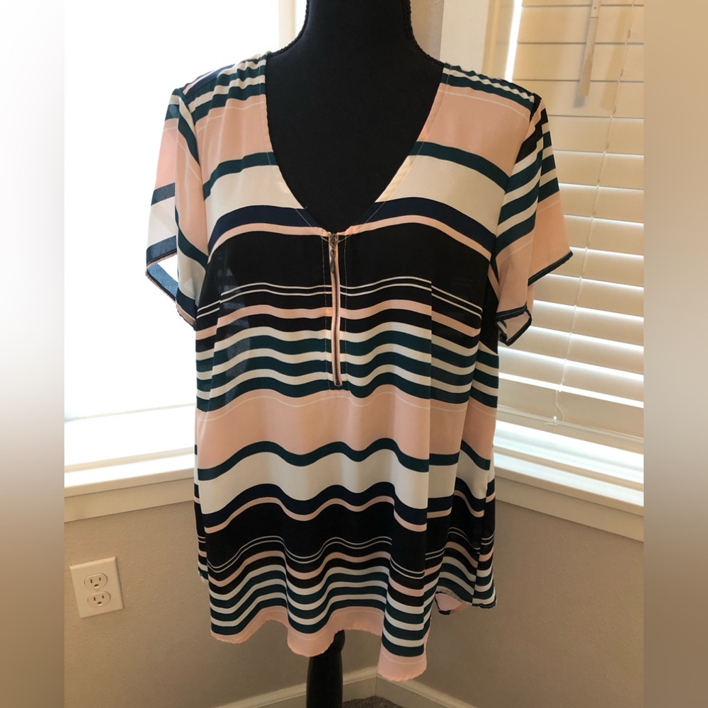 torrid size 0 stripped top. Size 12 in regular women’s size chart.
